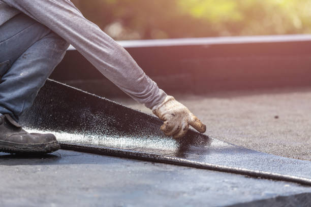 Professional Basement Waterproofing technician working in Morganville, NJ